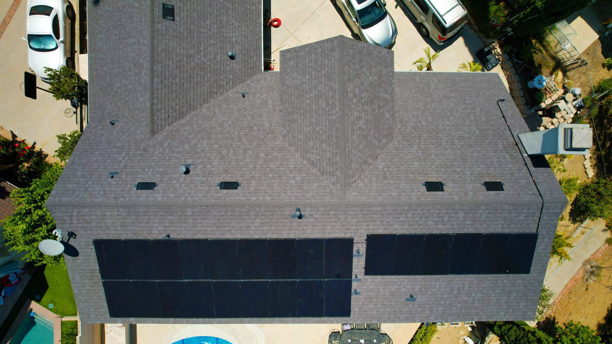Drone aerial photo of a brand new asphalt shingle roof replacement in Los Angeles, CA by EBA Roofing