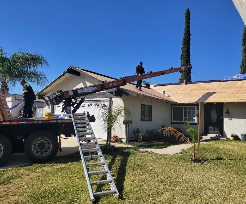 roofers doing roof maintenance
